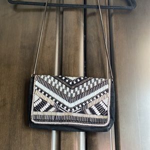 Bohemian boho beaded shoulder bag with beaded detail.